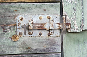 Closeup of an old rustic wooden barn door