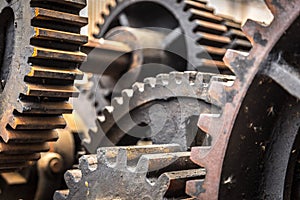 Closeup of old rusty cogs, gears, machinery.