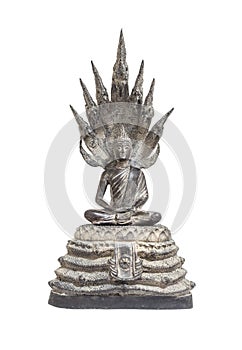 Closeup old silver buddha statue with a naga over his head isolated on white background with clipping path