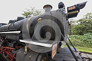 Closeup of old steam locomotive front view