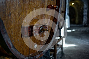 Closeup of an old wine barrel in a cellar in Switzerland