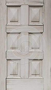 Closeup of an old wooden door in white