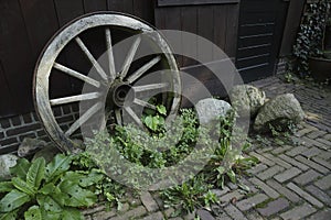 Close-up of an old wooden wagon wheel