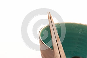 Closeup of One Bowl with Chopsticks