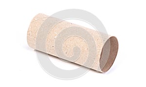 Closeup of one empty cardboard toilet roll, isolated on white background