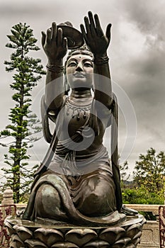 Closeup, One of the Six Devas offering to Tian Tan Buddha, Hong Kong China
