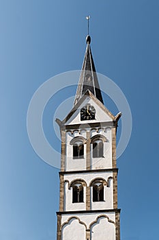 Closeup of one of the two towers of Saint Severus church in Boppard, Germany on a sunny afternoon