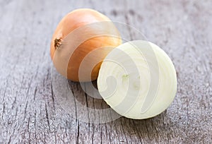 Closeup onion sliced on wood background, food ingredient concept