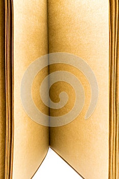 Closeup open pages brown paper book