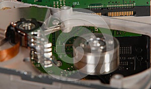 A closeup of an opened computer harddrive