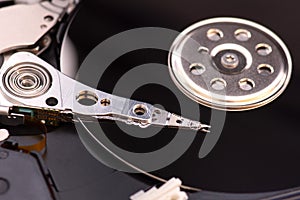 Closeup opened disassembled hard drive from the computer, hdd with mirror effect