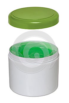 Closeup of a opened white plastic jar or container for cosmetic gel or cream with a green cap isolated on a white background.