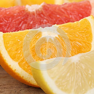Closeup of orange, lemon and grapefruit fruits