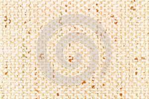 Closeup of orange, yellow and green colored wallpaper with white dots