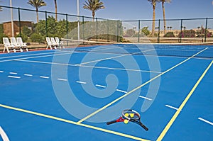 Closeup of outdoor clay tennis court with net