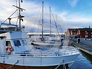 Closeup of the parked boats by the sea captured on a sunny day in Tonsberg, Norway