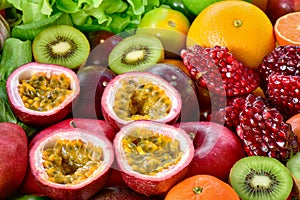 Closeup passion fruits with group of fresh fruits and vegetables