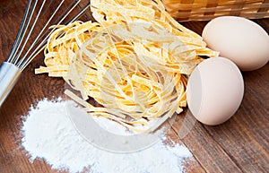 Closeup pasta and pair of eggs