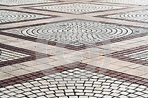 Closeup paving curved circle stone brick on pathway texture, abstract and background concept