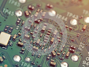 Closeup of PCB with small components on its surface. Electronics concept