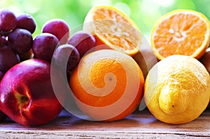 closeup of peach, orange and lemon fruits