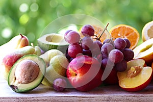 Closeup of peach, orange and lemon fruits