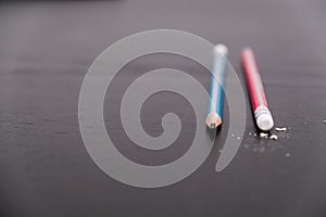 Closeup of pencil eraser on wooden table, soft focus. Mistake erase concept. correct or erase past errors