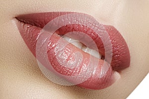 Closeup perfect natural lip makeup. Beautiful plump full lips on female face. Clean skin, fresh make-up. Spa tender lips