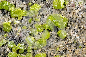 Closeup of a peridot or olivin mineral pattern background