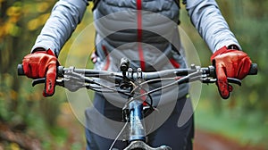 A Closeup Perspective of Hands Adorned in Red Gloves Taking Hold of a Handlebar with Confidence