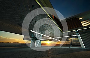 Closeup and perspective view of empty cement floor with steel and glass modern building exterior