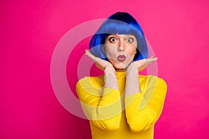 Closeup photo of attractive crazy lady modern look hold arms under new style hairdo wear stylish yellow turtleneck blue