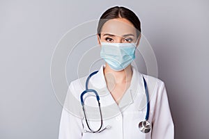 Closeup photo of attractive serious virologist doc lady experienced professional listen patient wear facial mask medical