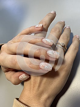 Closeup photo of a beautiful female hands with elegant manicure