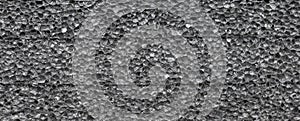 Closeup photo of closed cell polyethylene foam surface, abstract background