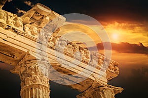 Closeup photo of faces and columns of beautiful Apollon Temple