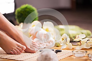 Closeup photo of a female feet at spa salon