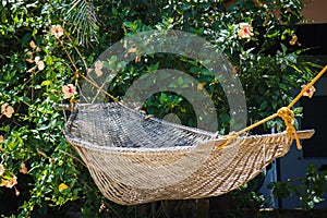 Closeup photo of hammock on tropical beach in San Vicente,Palawan Island, Philippines.