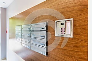 Closeup photo of letter box inside rental apartment business interior