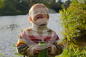 Closeup photo of a little girl. The baby is laughing.