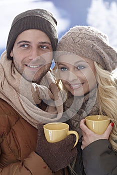 Closeup photo of loving couple at wintertime photo