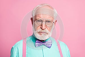 Closeup photo of mad aged man angry grimace negative facial expression offended wear specs mint shirt suspenders violet