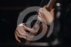 Male musician with guitar photo