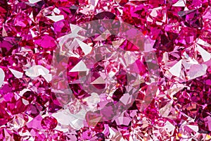 Closeup photo of many small ruby and diamond stones, luxury background.