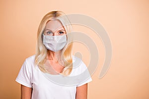 Closeup photo of middle age lady have breating mask good-looking stay home concept wear white casual t-shirt isolated
