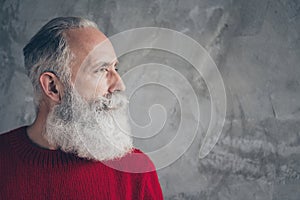 Closeup photo of nice aged guy looking side empty space minded wear red knitted pullover jumper cool hipster santa