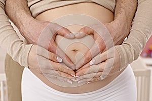 Closeup photo of pregnant tummy