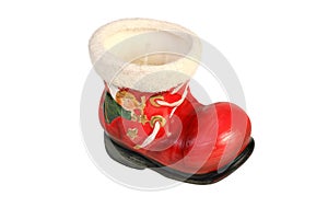 Closeup photo of a red boot-shaped christmas candle