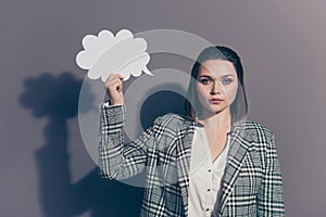Closeup photo of serious confident concentrated office lady holding white designed creative cloud in hands looking at