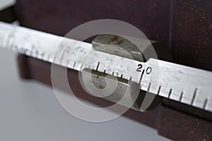 Closeup photo of vintage trip-scale, shallow DOF